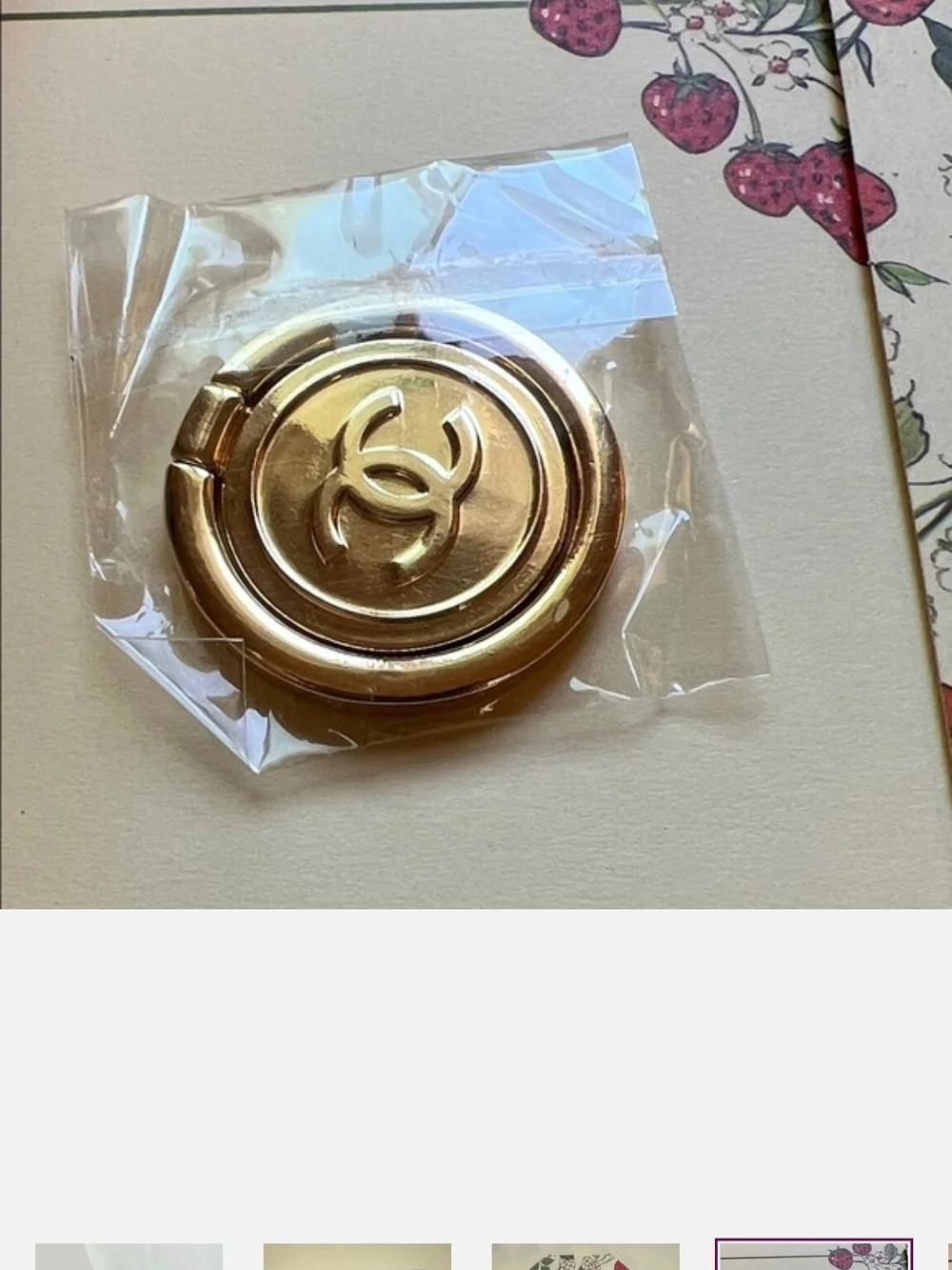 Gold Logo CC Ring Phone Holder. GWP